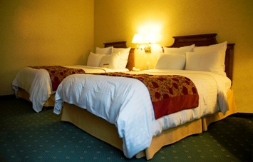 This photo of a pair of comfy beds ... the chief commodity sought when it comes to any type of lodging ... was taken by Christian Kitazume of Wuppertal, Germany.  These beds happen to be located at the Marriott Hotel in Hamburg, Germany.